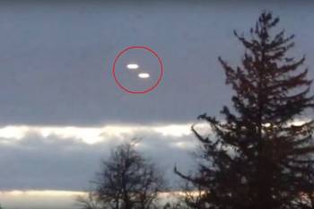 Очевидец из Канады зафиксировал группу ярких НЛО в облаках